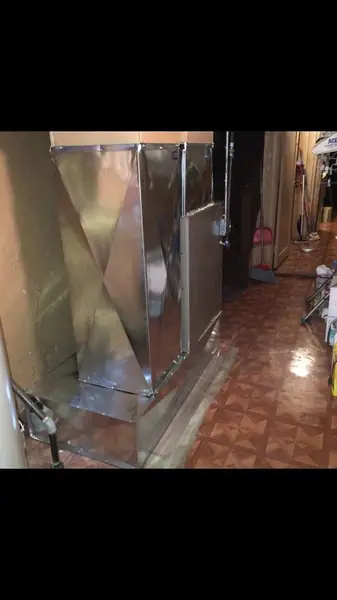 Ductwork running along a basement corridor